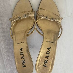 Authentic Prada gold kitten heels
